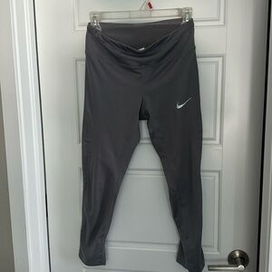 Women’s Nike Carpi Yoga Pants in Dri-Fit material